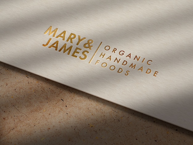 Mockup di logo in oro di lusso su carta kraft