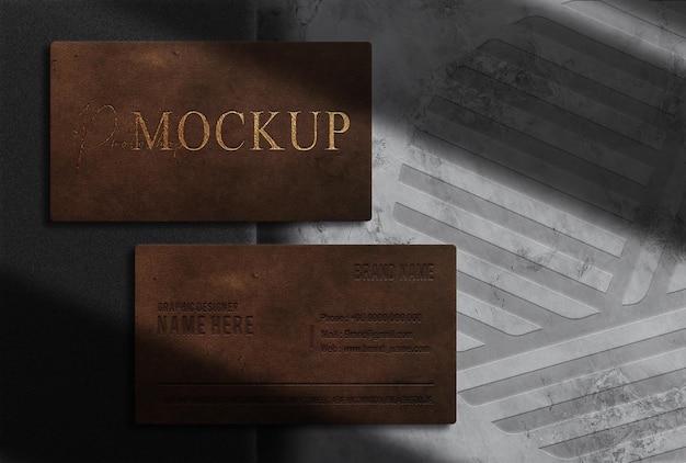 Luxury leather embossed business card top view mockup