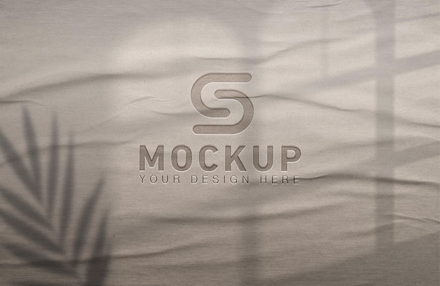 Mockup logo di lusso su carta vecchia con ombre