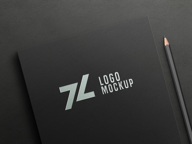 Mockup di logo di lamina d'argento di lusso su carta nera