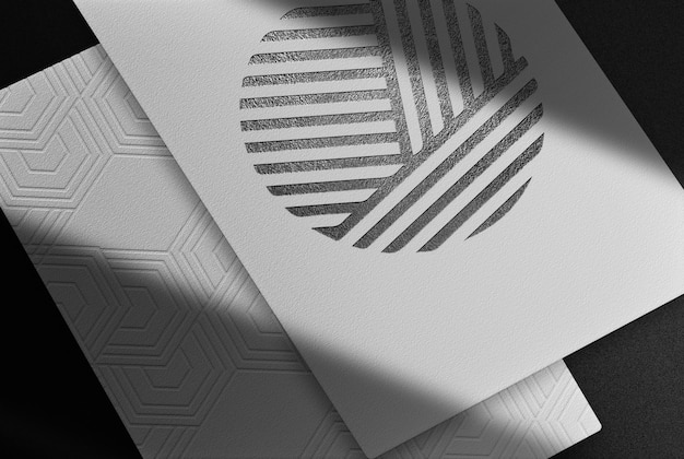 PSD luxury white paper with black embossed mockup