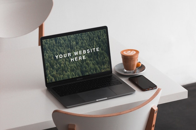 PSD macbook on table mockup