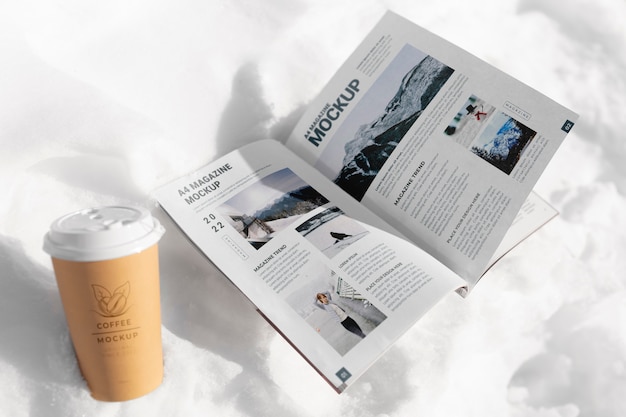 Magazine mockup on snow rock