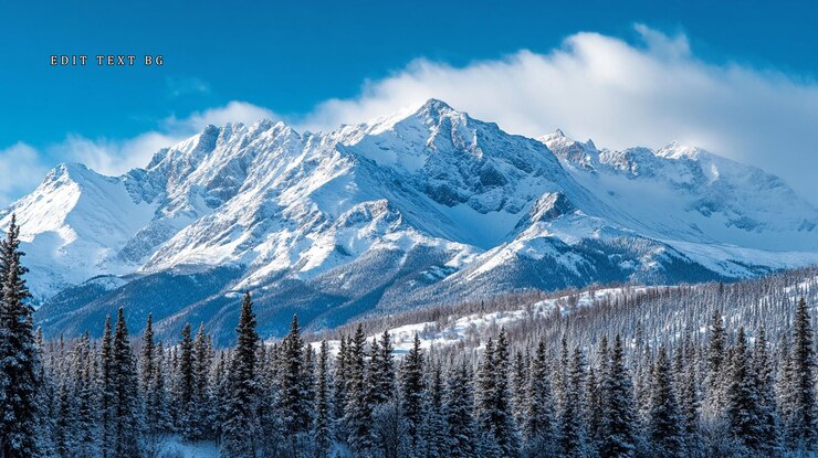 PSD majestic snowcapped mountain range with snowcovered evergreen forest in foreground under a vibrant blue sky
