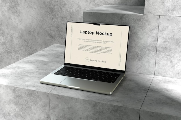 Makieta laptopa na tle cementu