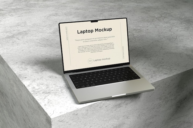 Makieta laptopa na tle cementu