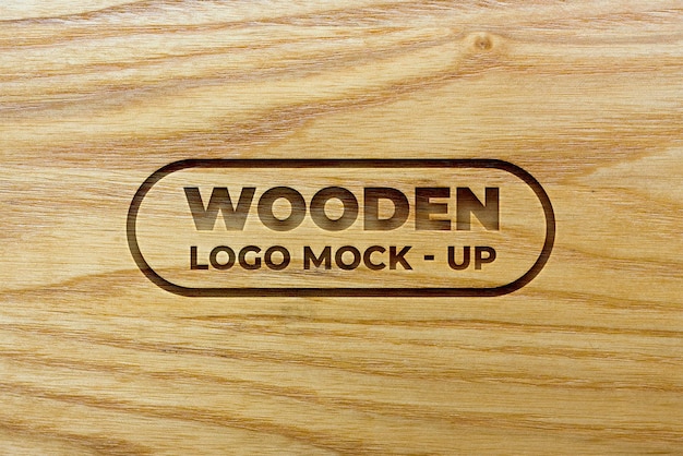 Makieta Logo Grawerowanego Efektu Na Drewnianej Teksturze Tła