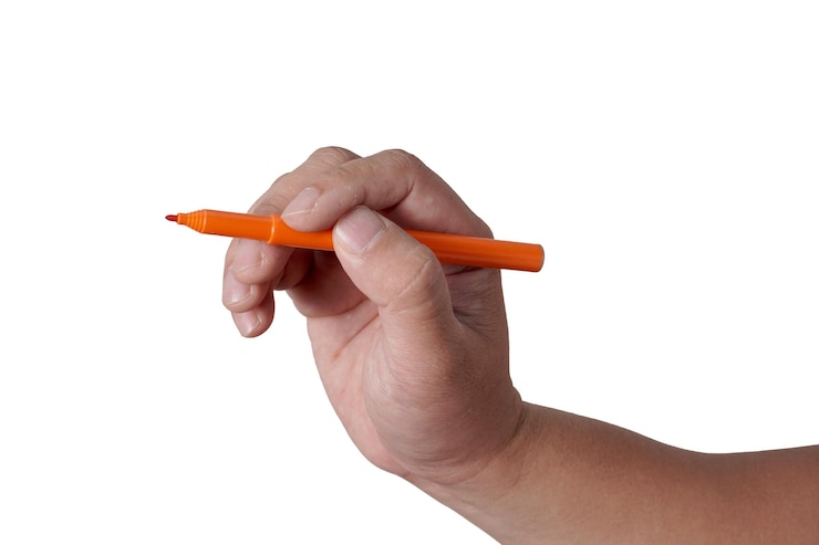 PSD male person hand holding pen writing cut out isolated