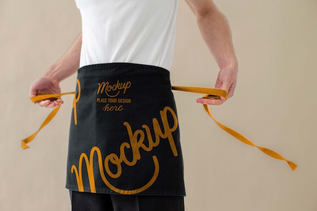 Male waiter wearing apron design mock-up