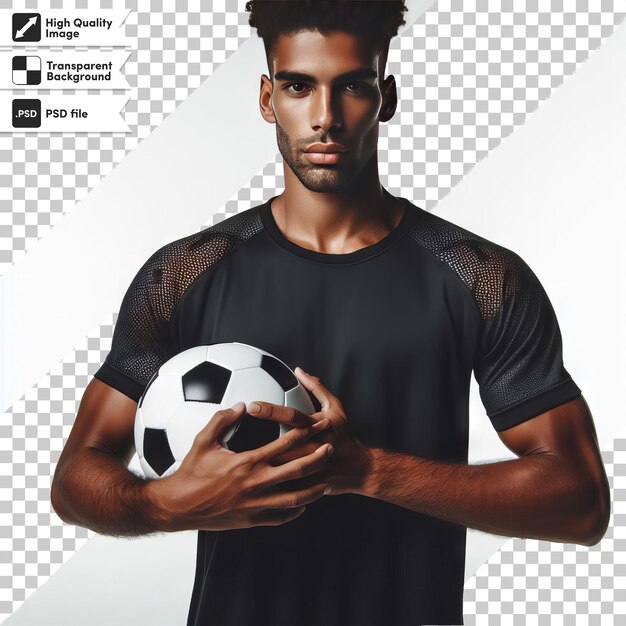 Un uomo con una camicia nera tiene in mano una palla da calcio