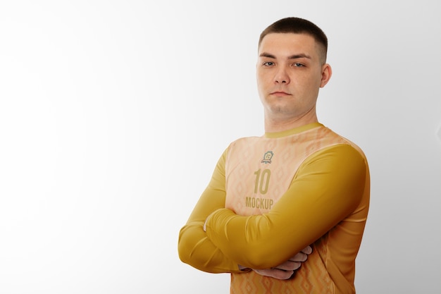 Man dressed in soccer mock-up kit