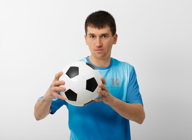 Man dressed in soccer mock-up kit