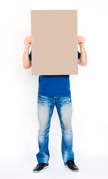 PSD man holding a blank brown board