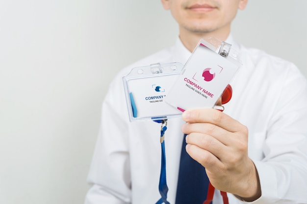 Man holding id card mockup