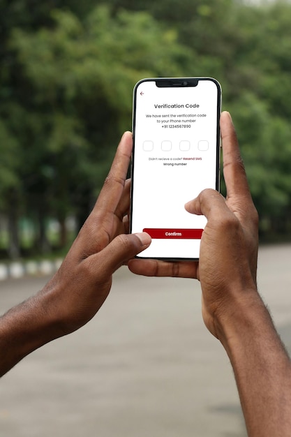 Man holding smartphone in hand