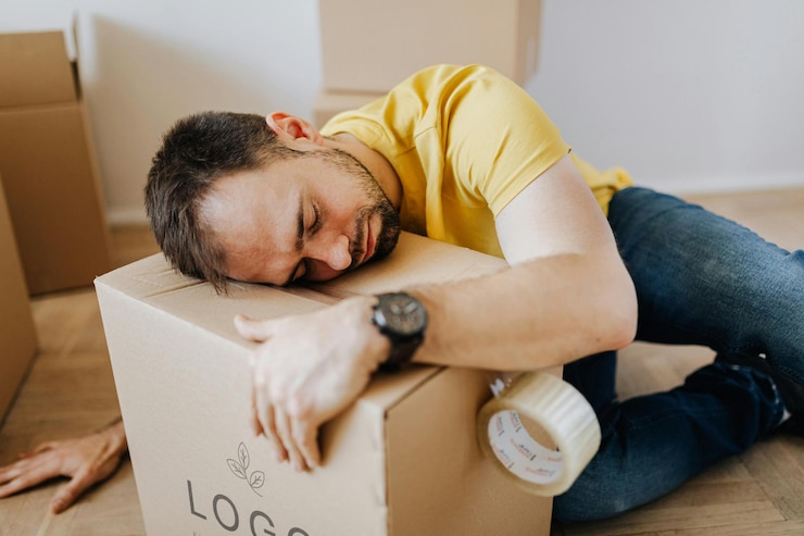 PSD a man is sleeping on a box that says quot ide quot