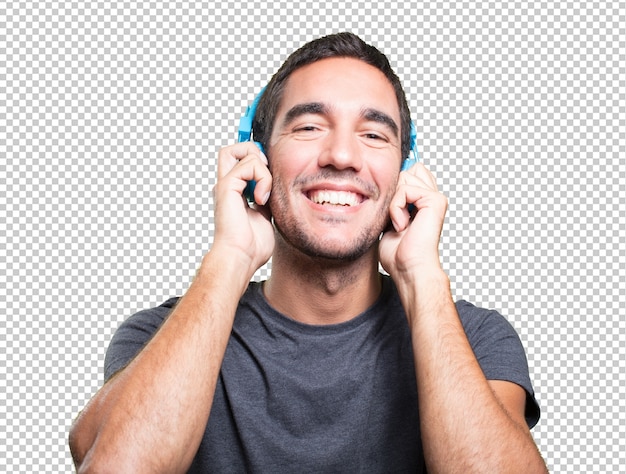 ヘッドフォンで音楽を聴く男