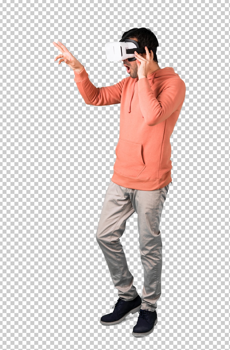 PSD man in a pink sweatshirt using vr glasses. virtual reality experience