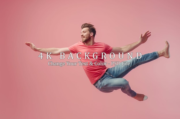 man in pink tshirt and blue jeans posing against pink background
