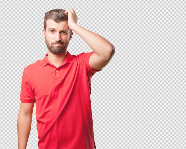 Man in red shirt thinking