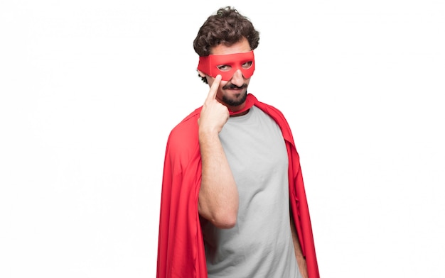 PSD man in superhero dress pointing at eyes