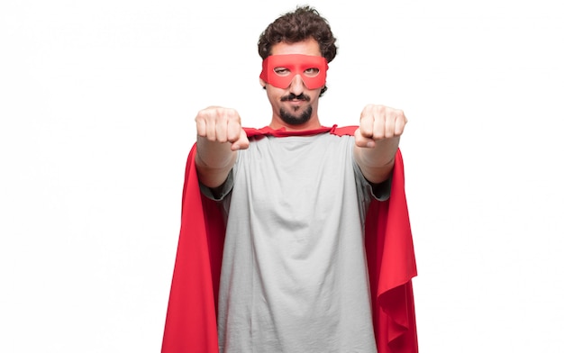 man in superhero dress in satisfied pose