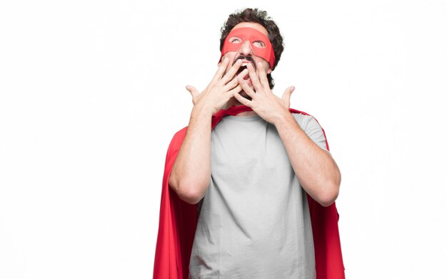 man in superhero dress yawning