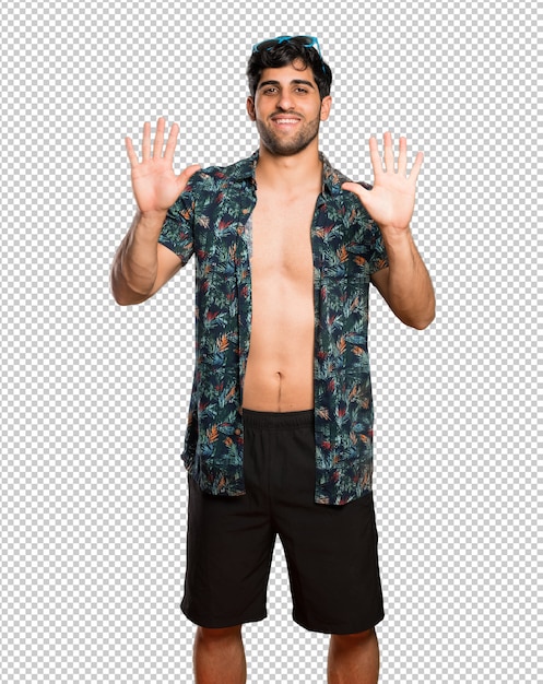 PSD man in trunks counting ten with fingers