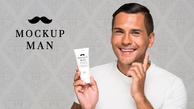 PSD man using face cream mock-up