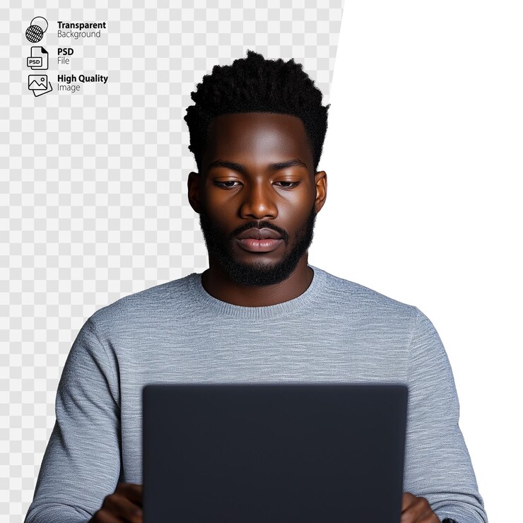 PSD man using a laptop concentrating on the screen on a transparent background