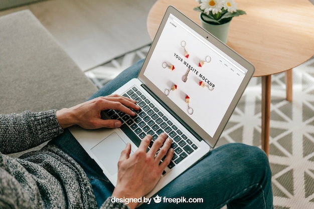 Man using laptop at home