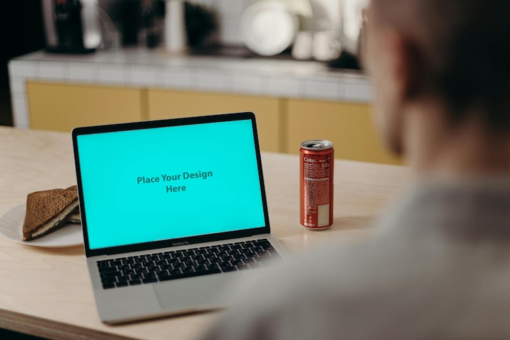 PSD man using laptop mockup psd design