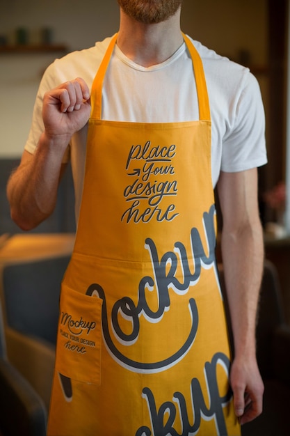 PSD man wearing apron mockup front view