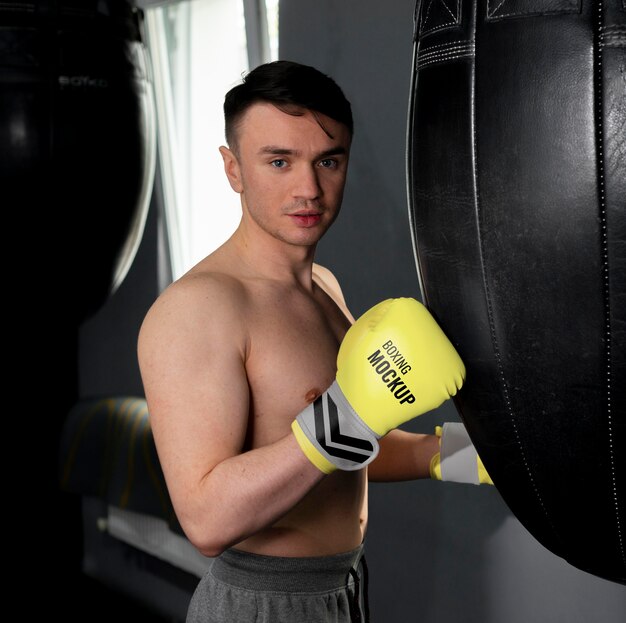 Man wearing boxing gloves mock-up