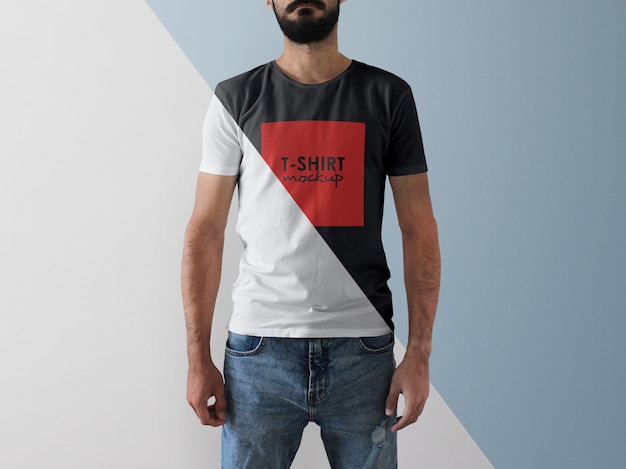 Man wearing t-shirt mockup with editable color