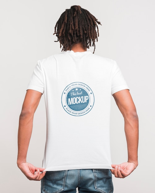 PSD man wearing t-shirt mockup