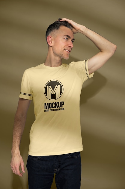 PSD man wearing t-shirt mockup