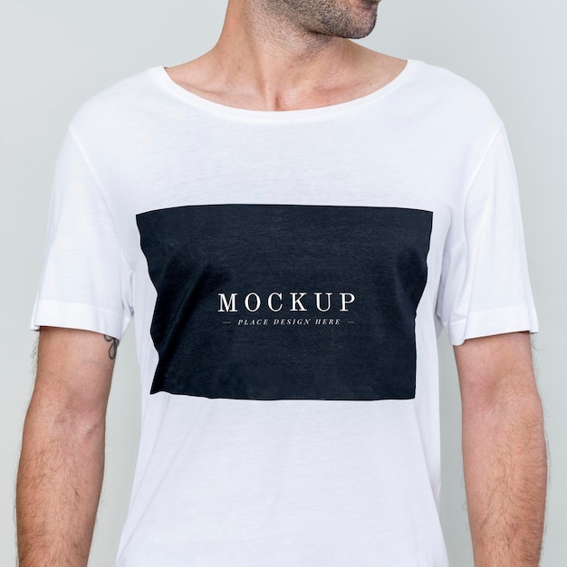 PSD man wearing white t-shirt mockup