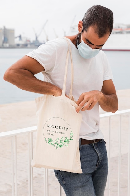 Man with bag mock-up concept