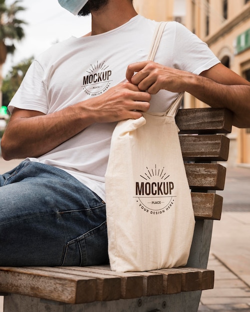 Man with bag mock-up concept