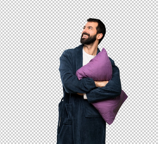 Man with beard in pajamas happy and smiling