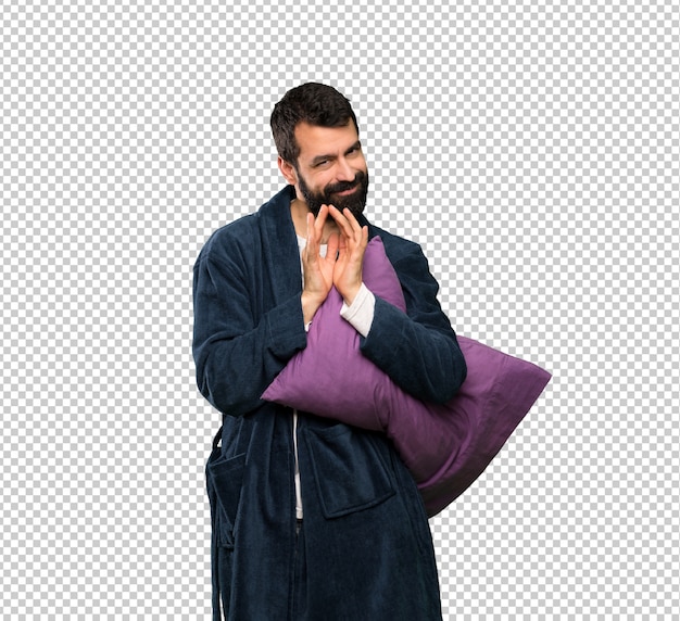 Man with beard in pajamas scheming something