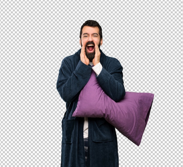 Man with beard in pajamas shouting and announcing something