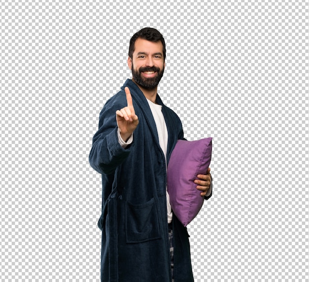 PSD man with beard in pajamas showing and lifting a finger