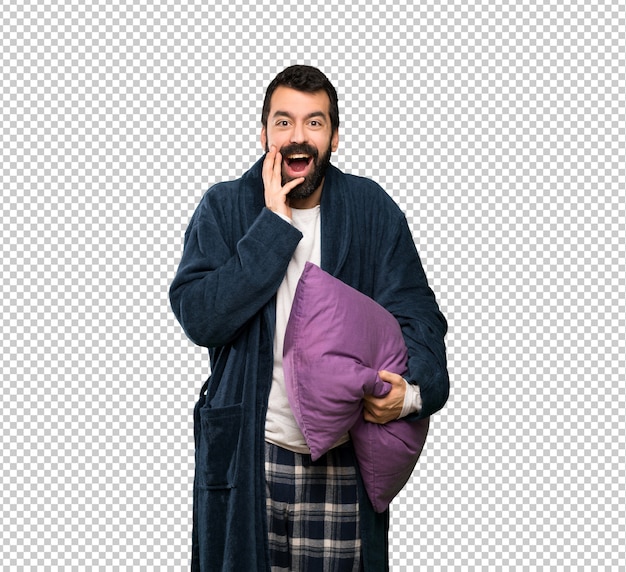 Man with beard in pajamas with surprise and shocked facial expression