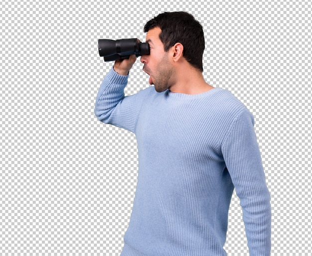 PSD man with blue sweater with black binoculars