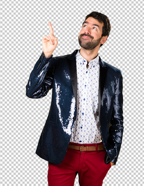 Man with jacket pointing up