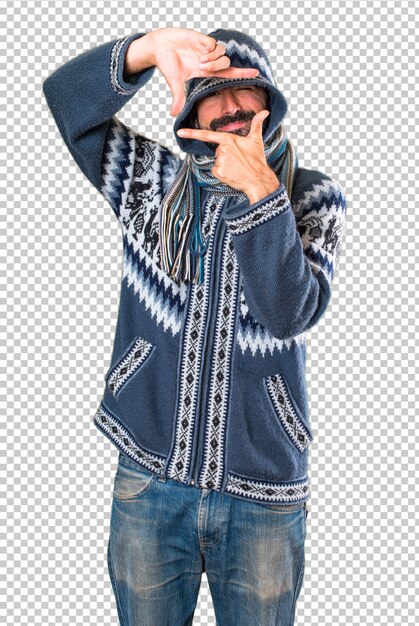 PSD man with winter clothes focusing with his fingers