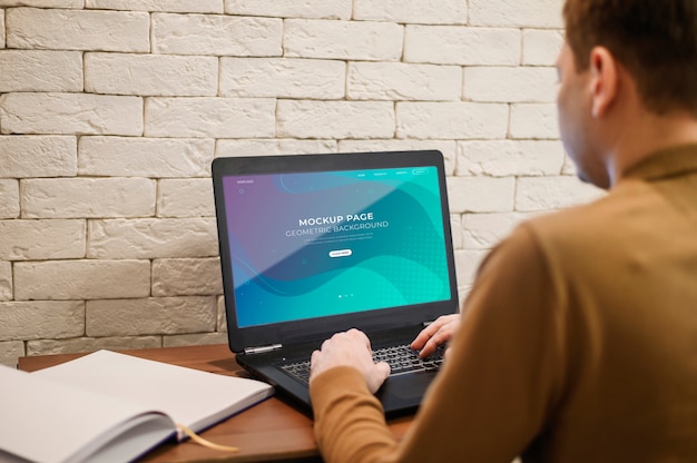 PSD man working at desk from home