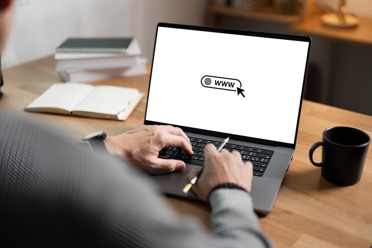 PSD man working on laptop